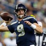 Seahawks quarterback Sean Mannion throws a pass against the Chargers during the second half of a preseason game on Aug. 28, 2021, in Seattle. (AP Photo/Elaine Thompson)