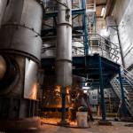 A worker disassembles a fluidized bed incinerator at the Edmonds Wastewater Treatment Plant last Thursday in Edmonds. (Olivia Vanni / The Herald)