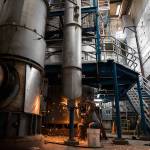 A worker disassembles a fluidized bed incinerator at the Edmonds Wastewater Treatment Plant on Thursday, Sept. 16, 2021 in Edmonds, Wa. (Olivia Vanni / The Herald)