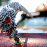 The hood ornament is among the numerous decorations on Russell Strucks Chevy S-10 truck wrapped in red flame cloth. (Kevin Clark / The Herald)