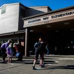 Parents drop their children off at Mountain Way Elementary for the first day of school on Wednesday in Granite Falls. (Olivia Vanni / The Herald)