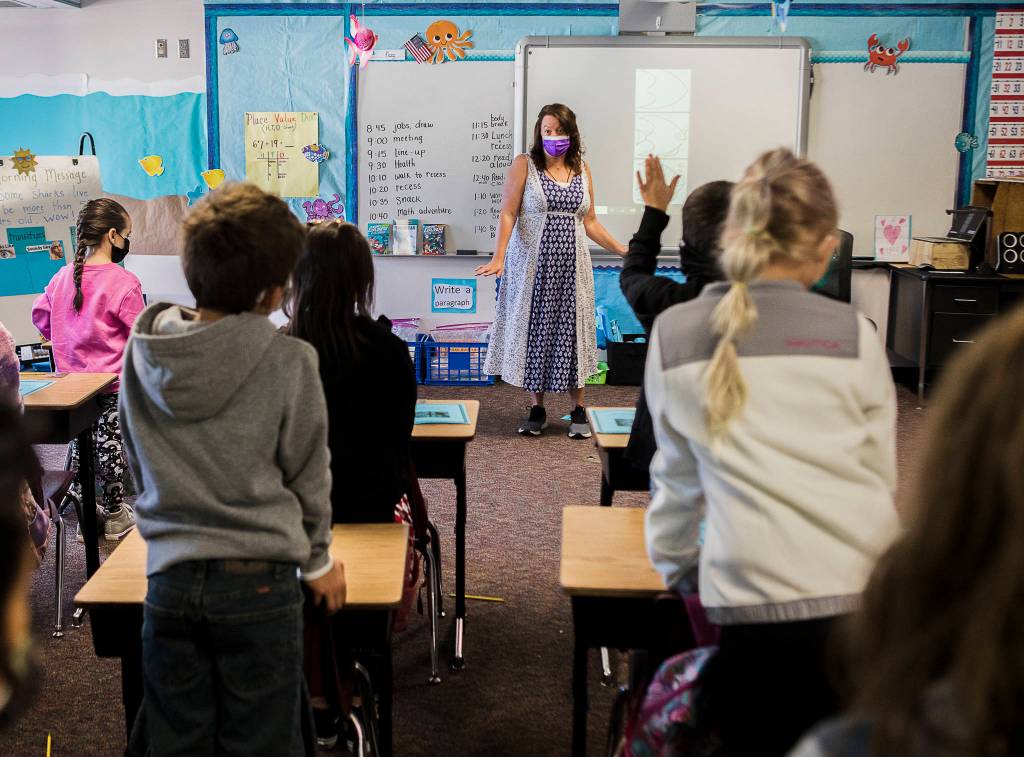 Laura Decker talks to her second grade class on the first day of school at Mountain Way Elementary on Wednesday in Granite Falls. (Olivia Vanni / The Herald)