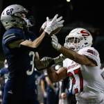 Glacier Peaks Ashton Olson makes a touchdown reception with Snohomishs Makai Williams defending at Veterans Memorial Stadium Friday night in Snohomish on March 12, 2021. (Kevin Clark / The Herald)