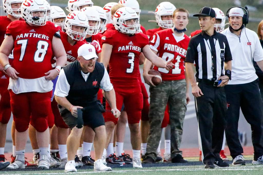 Snohomishs Joey Hammer, head coach, reacts to a call on the field Friday night at Veterans Memorial Stadium in Snohomish September 3, 2021. (Kevin Clark / The Herald)