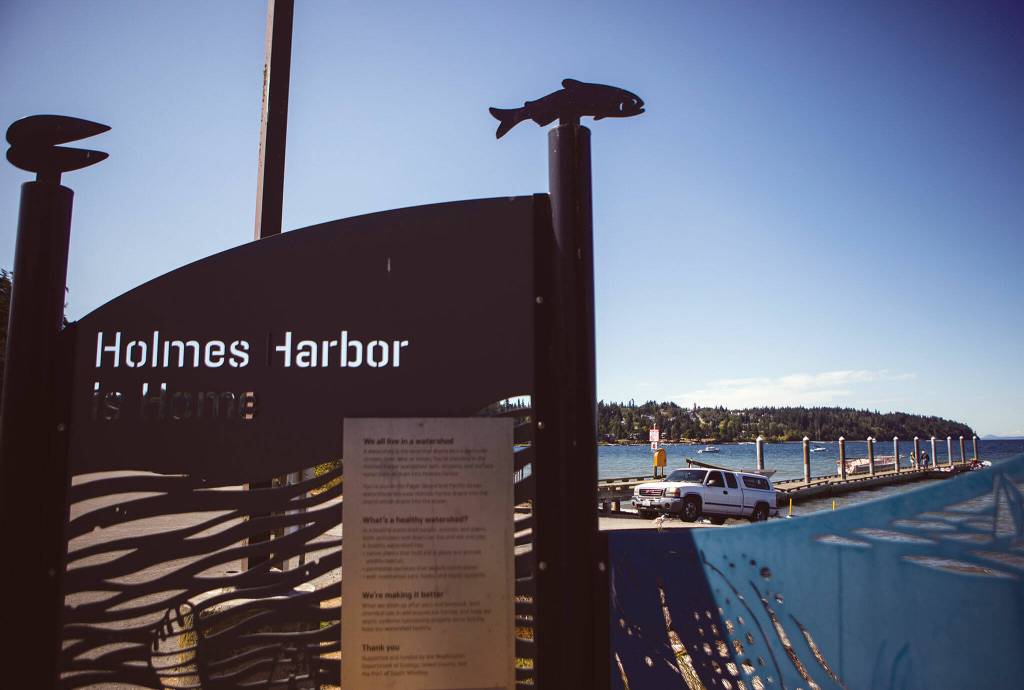 Boaters launch their vessels into Holmes Harbor at Freeland County Park. (Olivia Vanni / The Herald)