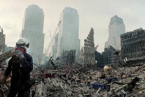 Rescue workers continue their efforts Monday, Sept. 24, 2001, at the site of the Sept. 11 World Trade Center terrorist attack in New York. (AP Photo/Ted S. Warren)