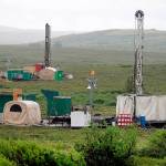 FILE - In this July 13, 2007, file photo, workers with the Pebble Mine project test drill in the Bristol Bay region of Alaska, near the village of Iliamma. The U.S. Environmental Protection Agency announced Thursday, Sept. 9, 2021, it would seek to restart a process that could restrict mining in Alaska's Bristol Bay region, which is renowned for its salmon runs. The announcement is the latest in a long-running dispute over a proposed copper-and-gold mine in the southwest Alaska region. (AP Photo/Al Grillo, File)