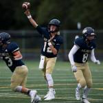 Arlingtons Trent Nobach throws the ball during the game against Oak Harbor on Friday, Sept. 10, 2021 in Arlington, Wa. (Olivia Vanni / The Herald)