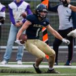 Arlingtons Hunter Eastman runs the ball during the game against Oak Harbor on Friday, Sept. 10, 2021 in Arlington, Wa. (Olivia Vanni / The Herald)