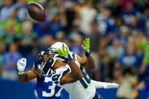Seattle Seahawks wide receiver Tyler Lockett (16) makes catch for a touchdown against the Indianapolis Colts in the first half of an NFL football game in Indianapolis, Sunday, Sept. 12, 2021. (AP Photo/Charlie Neibergall)