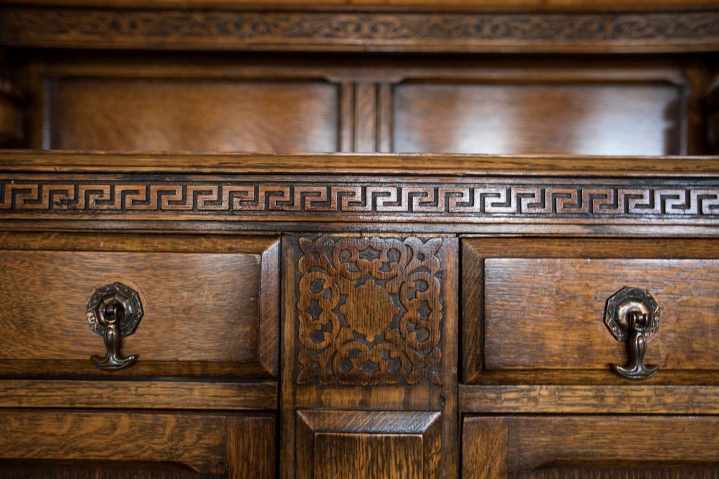 Details on a wooden chest in the dining area of the Van Valey House on Wednesday in Everett. (Olivia Vanni / The Herald)
