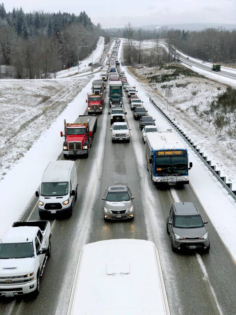 We dont get much snow here, but when we do, most everything grinds to a halt  including traffic. (Andy Bronson / Herald file)