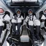 In this Sunday, Sept. 12, 2021 photo made available by SpaceX, from left, Chris Sembroski, Sian Proctor, Jared Isaacman and Hayley Arceneaux sit in the Dragon capsule at Cape Canaveral in Florida, during a dress rehearsal for the upcoming launch. The fully automated Dragon is the same kind that SpaceX uses to send astronauts to and from the International Space Station for NASA. But the chartered flight won't be going there. (SpaceX via AP)
