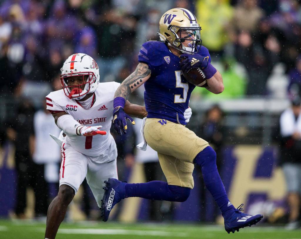 Washington Huskies running back Sean McGrew runs the ball into the end zone for a touchdown during the game against Arkansas State on Saturday, Sept. 18, 2021 in Seattle, Wa. (Olivia Vanni / The Herald)