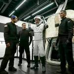 In this image taken from video, Chris Sembroski, one of four passengers aboard the SpaceX capsule, reacts after emerging from the capsule Saturday, after it was recovered following its splashdown in the Atlantic off the Florida coast. (Inspiration4 via AP)