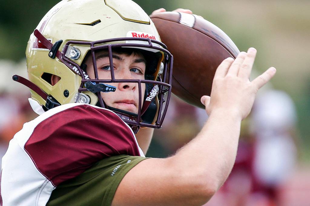 Lakewood dual-threat quarterback Justice Taylor was injured in the second series of the Cougars blowout loss to Sedro-Woolley. (Kevin Clark / The Herald)