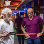 David Pallett, 77, works out with personal trainer Jim Hart on Aug. 30 at Optimal Sport Gym in Philadelphia. (Jose F. Moreno / The Philadelphia Inquirer)