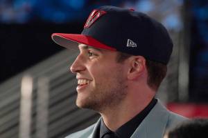 Corey Kispert reacts after being selected 15th overall by the Washington Wizards during the NBA basketball draft, Thursday, July 29, 2021, in New York. (AP Photo/Corey Sipkin)