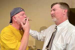 Oscar Madison, played by Joe Goins, left, annoys Felix Unger, portrayed by Thomas A. Glass, in Red Curtain’s production of “The Odd Couple,” showing through Sept. 26 at the Red Curtain Arts Center in Marysville. (Red Curtain)