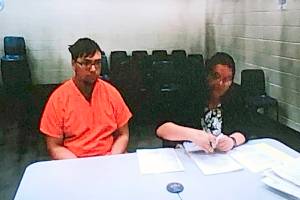 Michealob Johnson (left), 25, is accused of killing Jae An at the Food Mart in the 6900 block of Broadway in Everett. (Caleb Hutton / Herald file)