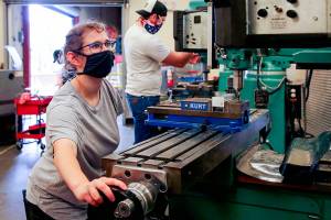 Pamela Propeck works on an assignment at the Advanced Manufacturing Training & Education Center Wednesday morning at Everett Community College on June 3, 2020. (Kevin Clark / The Herald)
