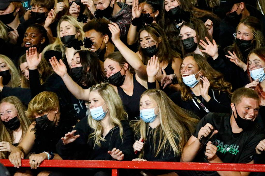 Stanwoods fans rally in the stands during the Stilly Cup on Friday night at Stanwood High School. (Kevin Clark / The Herald)