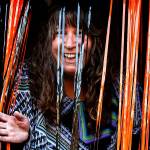 Ivy Fulmer emerges from a spooky tunnel she built for the children who visited her on Halloween in Everetts Riverside nighborhood in 2019. (Dan Bates / Herald file)