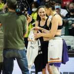 Seattle Storms Sue Bird and Phoenixs Diana Taurasi trade jerseys after the second-round, single elimination playoff game at Angel of the Winds Arena on Sunday in Everett. (Olivia Vanni / The Herald)
