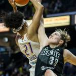 Seattle Storms Katie Lou Samuelson tries to block a shot by Phoenixs Brianna Turner during the second-round, single elimination playoff game at Angel of the Winds Arena on Sunday in Everett. (Olivia Vanni / The Herald)