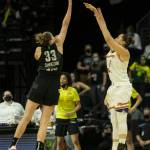 Seattle Storms Katie Lou Samuelson jumps to block a 3-point shot by Phoenixs Diana Taurasi during the second-round, single elimination playoff game at Angel of the Winds Arena on Sunday in Everett. (Olivia Vanni / The Herald)