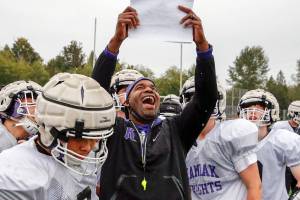 Bryant Thomas, head coach, calls the play Wednesday afternoon during practice at Kamiak High School in Mukilteo on September 29, 2021. (Kevin Clark / The Herald)