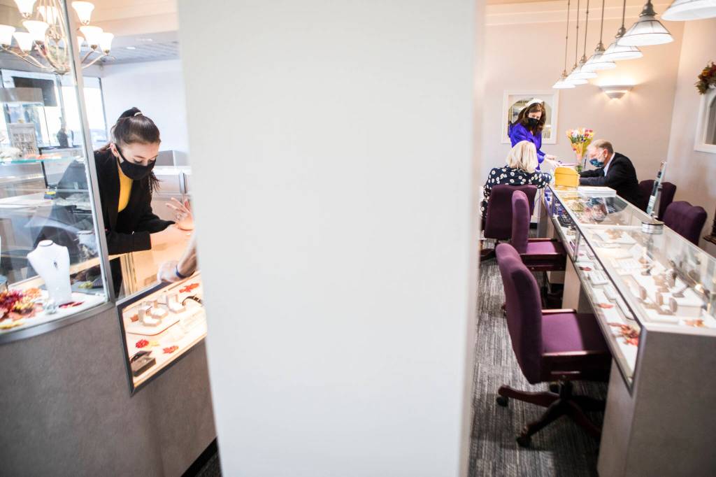 Employees help customers at Wagner Jewelers in Marysville. (Olivia Vanni / The Herald)