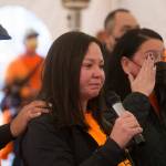 Rochelle Lubbers (center) tears up as she talks about putting her native identity aside while attending school as she and the Tulalip Tribes community gathered at the last remaining building from the Tulalip Indian boarding school for a Day of Remembrance on Thursday in Tulalip Reservation. (Andy Bronson / The Herald)