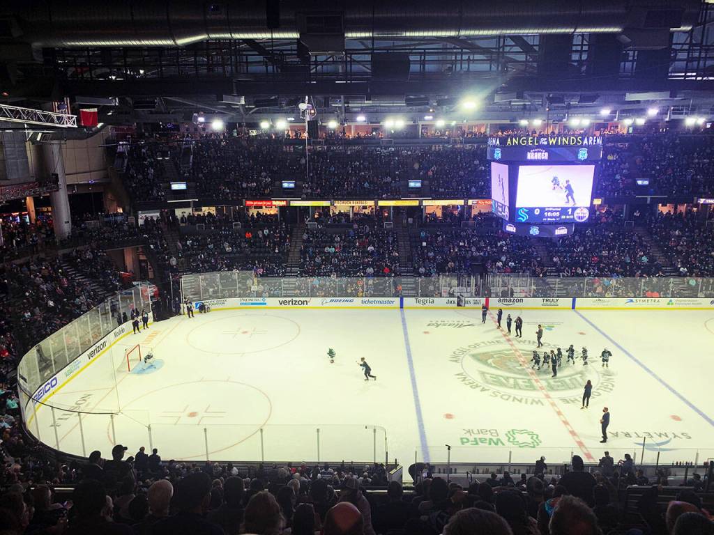Members of the under-8 youth Silvertips squad try to score in a shootout on the NHL ice. (Jake Goldstein-Street / The Herald)