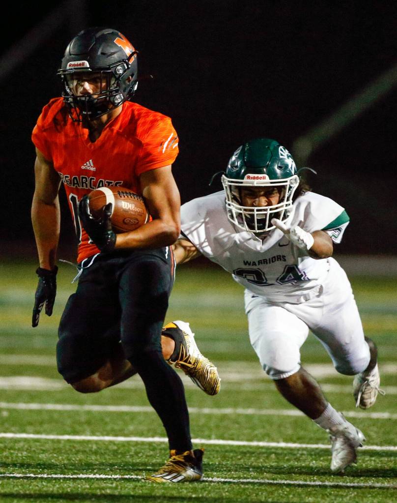 Senior receiver Cole Pruett totaled 200 yards from scrimmage for Monroe. (Kevin Clark / The Herald)