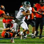 Edmonds-Woodway senior running back Aaron Barraza had a breakout performance in the Warriors 33-28 win over Monroe last Friday night. (Kevin Clark / The Herald)