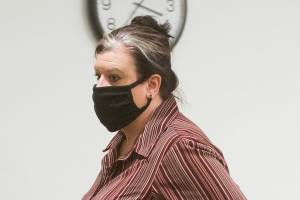 Alexis Wafstet, 45, walks out of court, after admittiong guilt to introducing contraband in the second degree ,at the Snohomish County Courthouse on Tuesday, Oct. 5, 2021 in Everett, Washington. Wafstet pleaded guilty for smuggling narcotics into the jail according to her employer, the Snohomish County Sheriffճ Office. (Andy Bronson / The Herald)