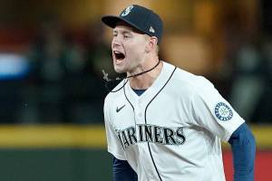 Seattle Mariners center fielder Jarred Kelenic reacts after the Mariners beat the Oakland Athletics 4-2 in a baseball game, Wednesday, Sept. 29, 2021, in Seattle. (AP Photo/Ted S. Warren)