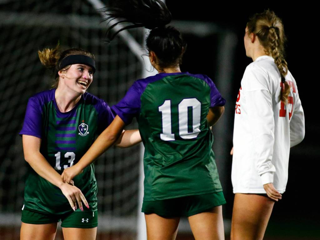 Edmonds-Woodways Marley Davis celebrates her goal with teammate Deanna Montero Vega Thursday night at Edmonds-Woodway High School in Edmonds on October 7, 2021. (Kevin Clark / The Herald)