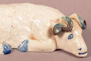 Many 19th-century potteries and amateur artists made and decorated stoneware figures. This handmade ram sold at Conestoga Auctions for $144. (Cowles Syndicate Inc.)