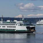 Ferries pass on a crossing between Mukilteo and Whidbey Island. File Photo by Andy Bronson/Daily Herald