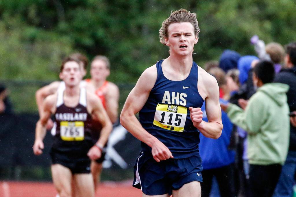 Arlington senior Aiden Emerson placed eighth in the boys elite race. (Kevin Clark / The Herald)