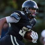 Lynnwood's Anthony Hooker runs the ball during the game against Everett on Friday, Oct. 8, 2021 in Edmonds, Wa. (Olivia Vanni / The Herald)