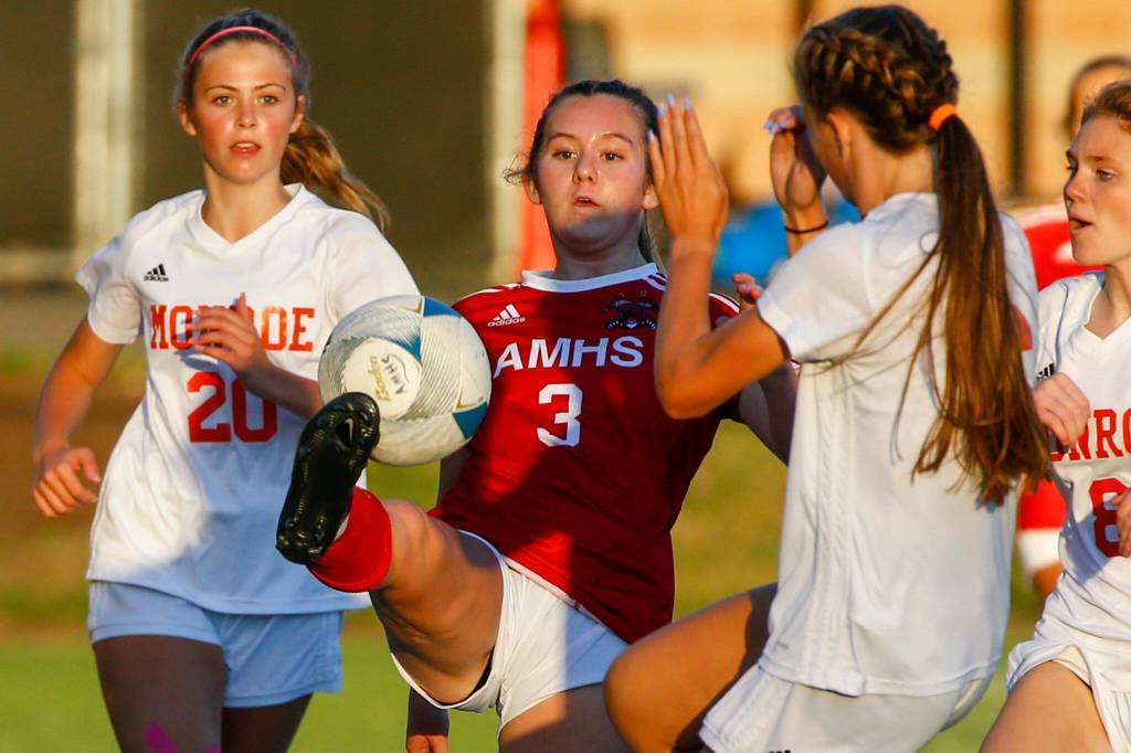 Archbishop Murphys Cameron Bourne gathers a throw-in during a game against Monroe on Sept. 23, 2021, at Archbishop Murphy High School in Everett. (Kevin Clark / The Herald)