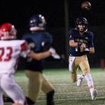Trent Nobach threw for 245 yards and two touchdowns to lead Arlingtons fast-paced aerial attack. (Olivia Vanni / The Herald)