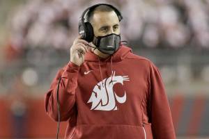 Washington State head coach Nick Rolovich looks on during the second half of an NCAA college football game against Stanford, Saturday, Oct. 16, 2021, in Pullman, Wash.(AP Photo/Young Kwak)