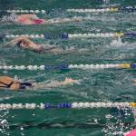Snohomishs Macky Blackwell takes a breath while a teammate cheers her on during the 200 Yard Freestyle on Tuesday, Oct. 19, 2021 in Snohomish, Wa. (Olivia Vanni / The Herald)