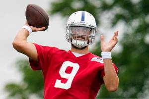 Indianapolis Colts quarterback Jacob Eason runs a drill during practice at the NFL team's football training camp in Westfield, Ind., Wednesday, July 28, 2021. (AP Photo/Michael Conroy)