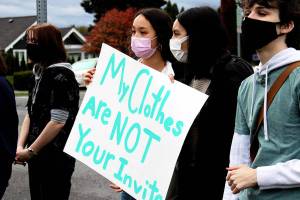 Snohomish School District students demonstrated in front of Snohomish High School Friday morning to protest sexual misconduct after a high school student said she was forcibly kissed in a hallway. (Isabella Breda / The Herald) 20211022