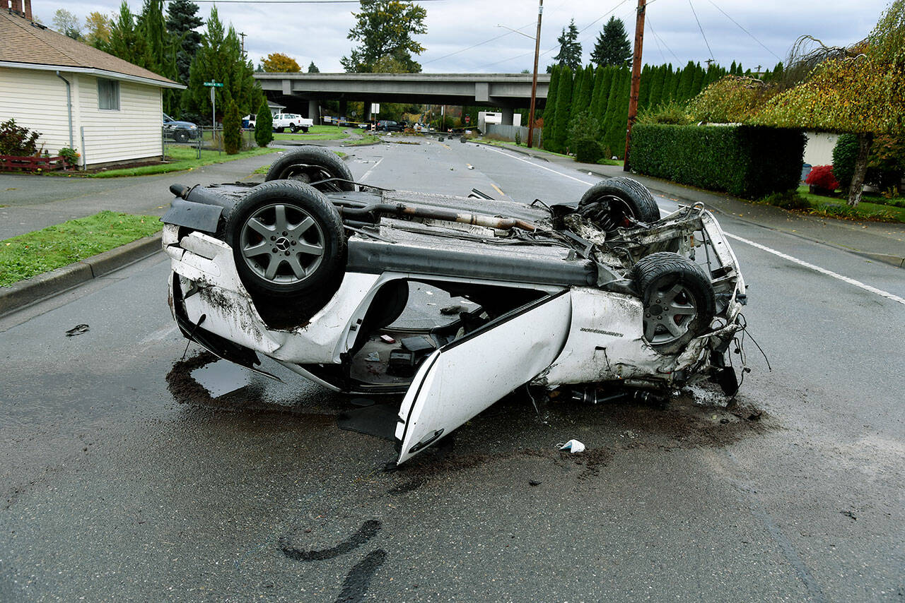 This crash in Monroe happened early Friday morning after police discontinued a high-speed chase. Both occupants were taken to a hospital. (Monroe Police Department)